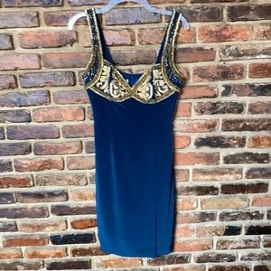 Elegant Blue Dress with Gold Embellishments